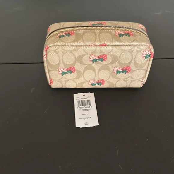 Coach light khaki multi strawberry large cosmetic bag excellent condition.